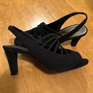 Black Nue Options Stretch heels. They are a size 7.